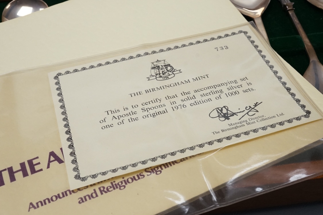 A cased set of thirteen Birmingham Mint limited edition silver apostle spoons, London, 1977, 14.3cm, 14.3oz.